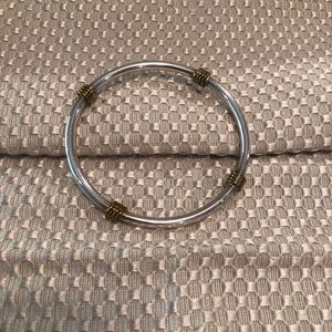 Jewelry - sterling silver bangle bracelet with gold accents Jewelry - sterling silver bangle bracelet with gold accents